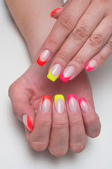 orange, yellow, pink French manicure on long nails square