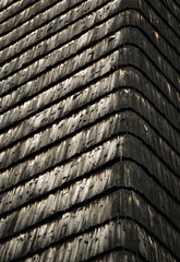 corner of the house paneling wooden shingles