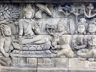 The 9th-century stone carving at BorobudurTemple, telling the history of Buddhism, in Magelang Regency, near Yogyakarta, Indonesia