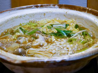 vegetables for the food served in a pot