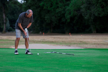 man playing golf