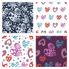 Fototapeten Set of seamless vector patterns with hearts. Backgrounds with colorful hand drawn ornamental symbols. Decorative repeating ornament. Series of Love Seamless vector Patterns. © Valentain Jevee
