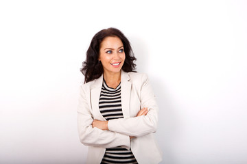 Business casual woman smiling with arms crossed