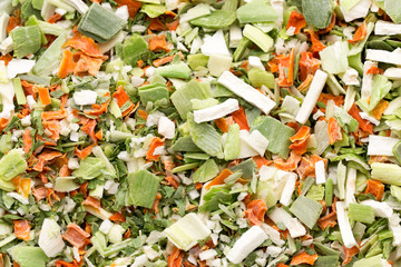 Dried vegetable spice. Bio herbs product. Finely chopped herbs.