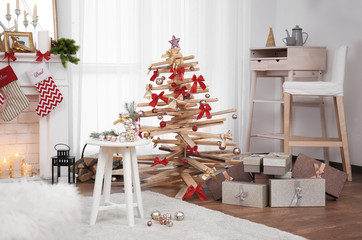 Creative Christmas tree in living room interior
