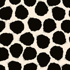 Hand painted seamless pattern with brush strokes in black on cream background