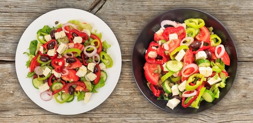 Greek salad on wooden background