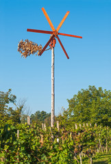 Traditional wind rattle in vineyard, Slovenia