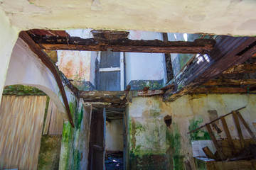 Interior of destroyed housing and full of moisture