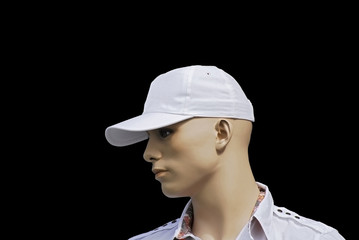 Tête de mannequin type caucasien à casquette blanche de profil © didier salou