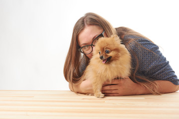 pomeranian with owner.