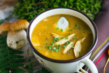 Creamy Mushroom Soup on old wooden background