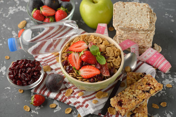 Muesli with a fresh strawberries and figs