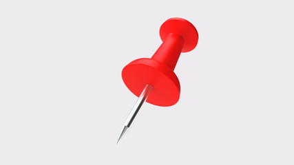 A Red Thumbtack Shot From A Low Angle