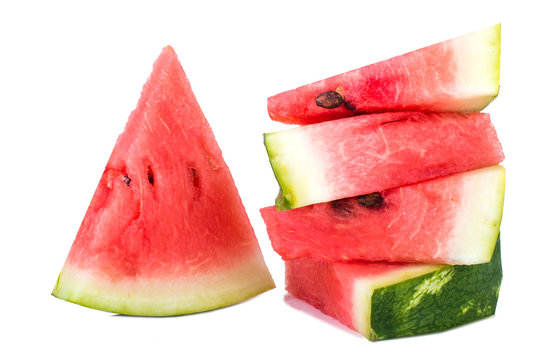 Triangular pieces of watermelon with seeds .On white isolated fone.
