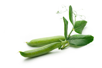 Fresh green peas with leaves