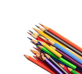 Fototapeta premium Drawing supplies: assorted color pencils on white background