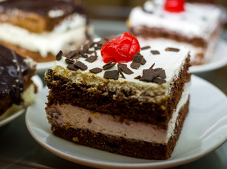 Fototapeta na wymiar Sponge cake, decorated with cherry berry
