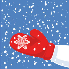 Red glove with winter snowflake
