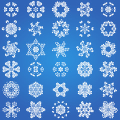 Large collection of delicate intricate snowflakes