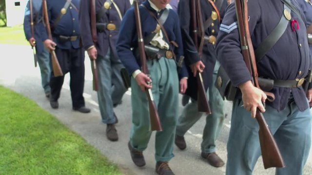 Civil War soldiers begin slowly marching