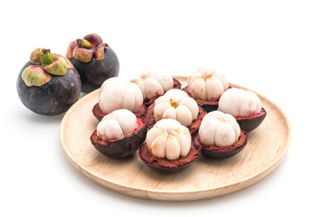 fresh mangosteen on white