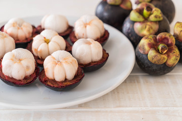 fresh mangosteen on wood
