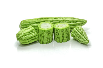 Isolated of green bitter gourd sliced on the white background