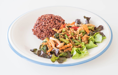 berry rice with stir-fried tofu protein and basil