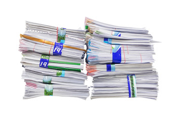 close up of stack of papers on white background