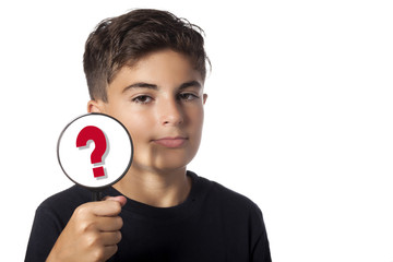 child with magnifying glass and question mark