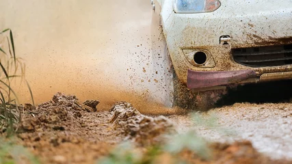 Gordijnen Rally car in muddy road © toa555