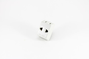 White adaptor plugs on white background isolated.