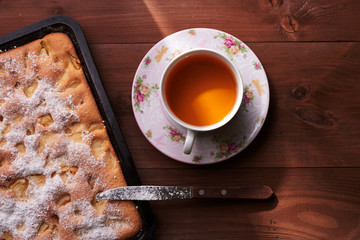 apple pie charlotte on the wooden table