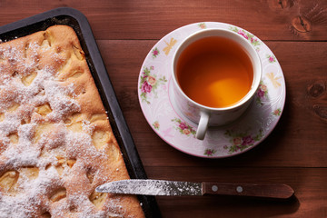 apple pie charlotte on the wooden table