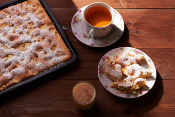 apple pie charlotte on the wooden table
