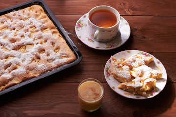 apple pie charlotte on the wooden table