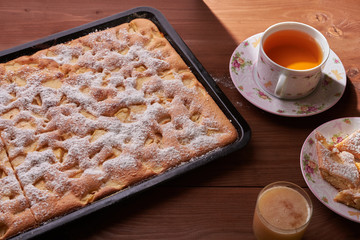 apple pie charlotte on the wooden table