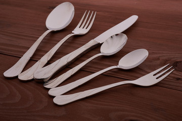 set of cutlery on a wooden table