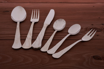 set of cutlery on a wooden table