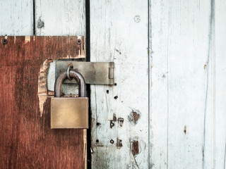 Old lock on a wooden door, With place your text (lock, rust, security)