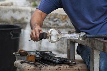 glassblower working on a piece