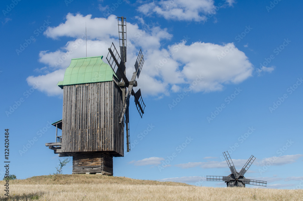 Wall mural Old windmills in museum