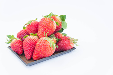 Strawberry on white background fruit's healthful cordial, useful