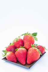 Strawberry on white background fruit's healthful cordial, useful