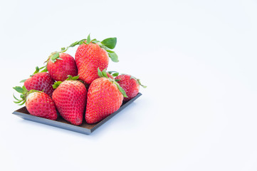 Strawberry on white background fruit's healthful cordial, useful