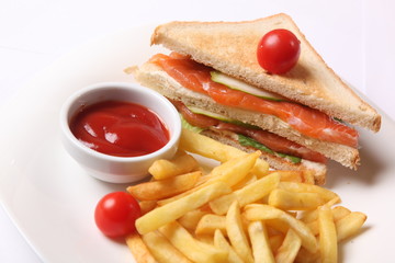 sandwich with french fries and sauce