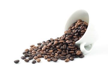 Cooffe beans and wihte cup isolated on white