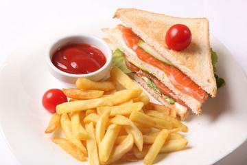 sandwich with french fries and sauce