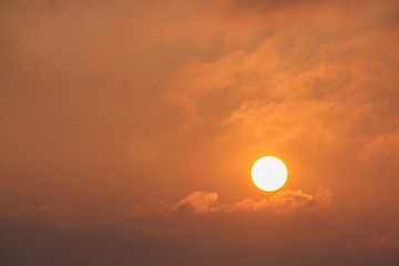 Fiery orange sunrise and dramatic golden sky in the morning at Chiangmai province, Thailand